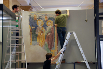 Transfer of fragments of 12th century murals.