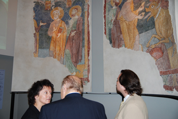 Transfer of fragments of 12th century murals.